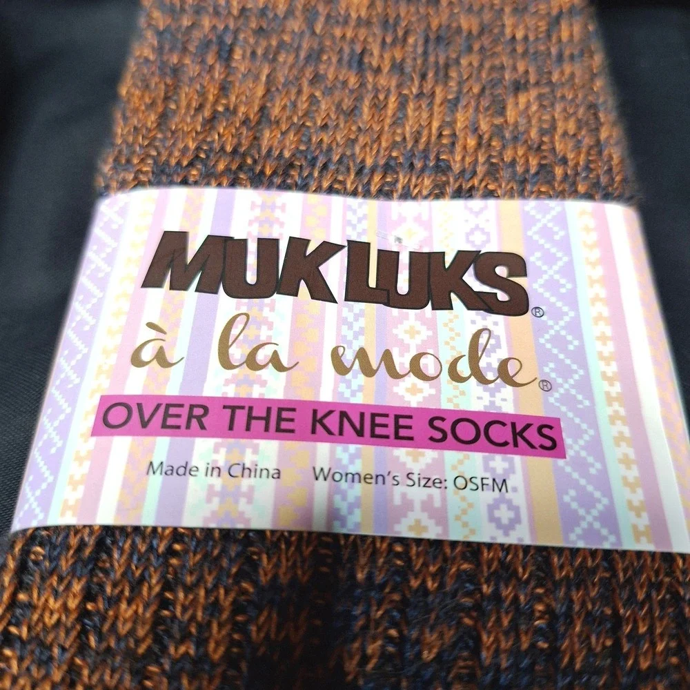 Women's one pair‎ of Mukluks Over the knee socks and on pair of Shark bite socks